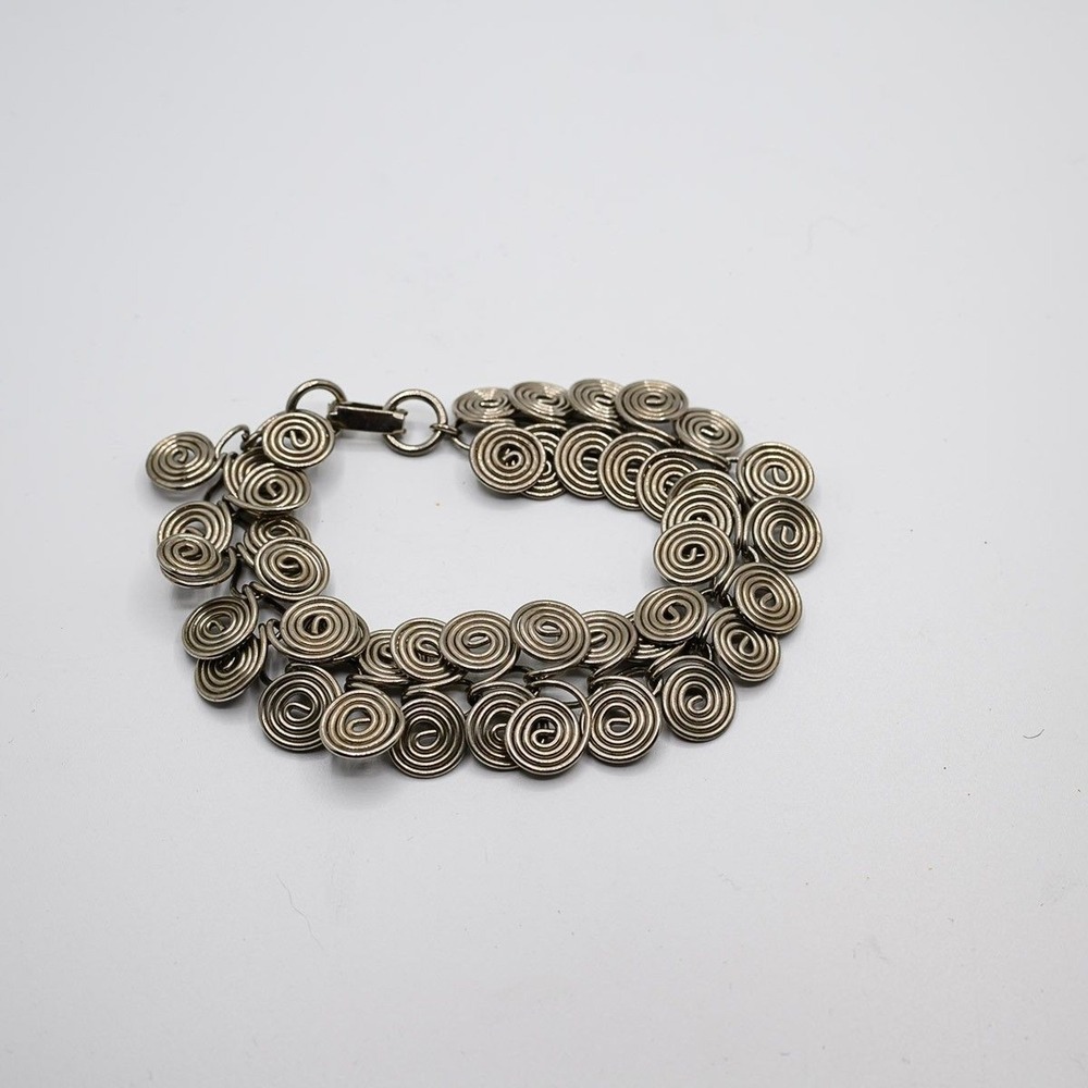 Bracelet hand-wrought Silver Tone swirl bracelet 9"